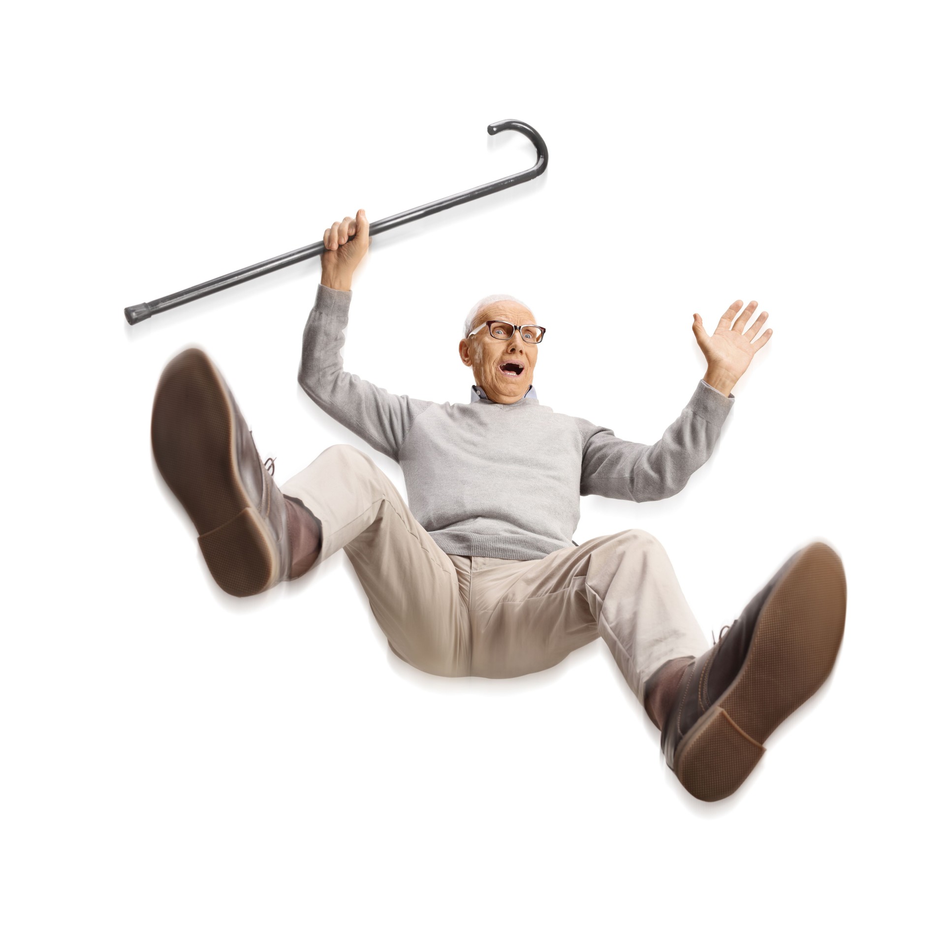 Scared elderly man with a cane falling
